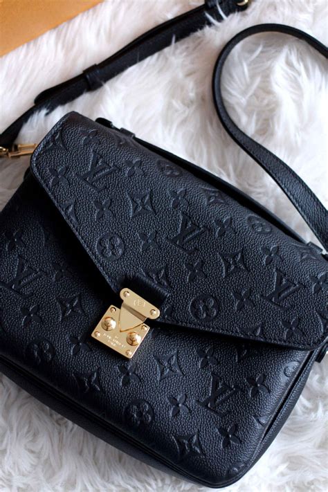 louis vuitton pochette black and white|louis vuitton pochette métis monogram.